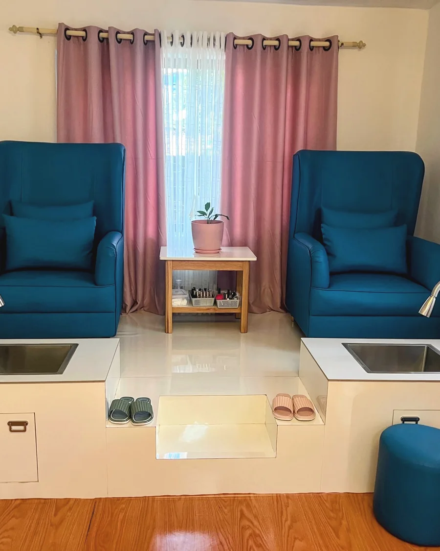 Stock photo of a pedicure station with two chairs